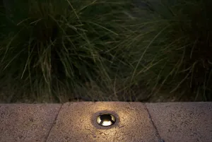 Brilliance VersaBeam Brass Round Quad Slot Flange in Black Finish 2700K